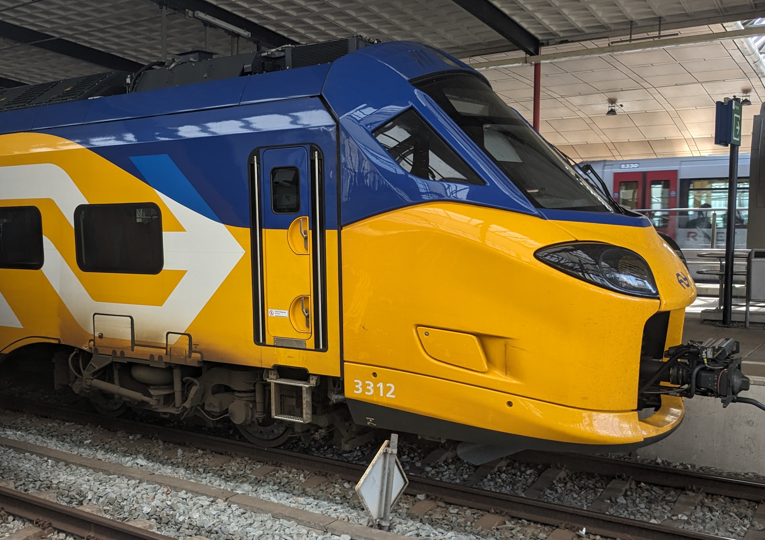 Photo of a shiny ICNG trainset parked at a station.